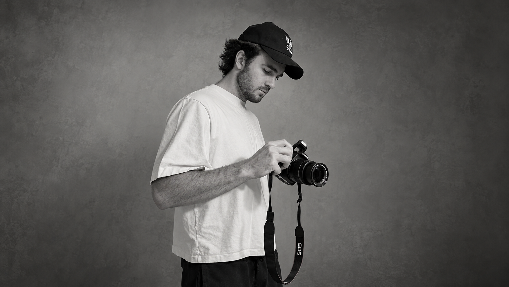 Eli Willis holding a camera