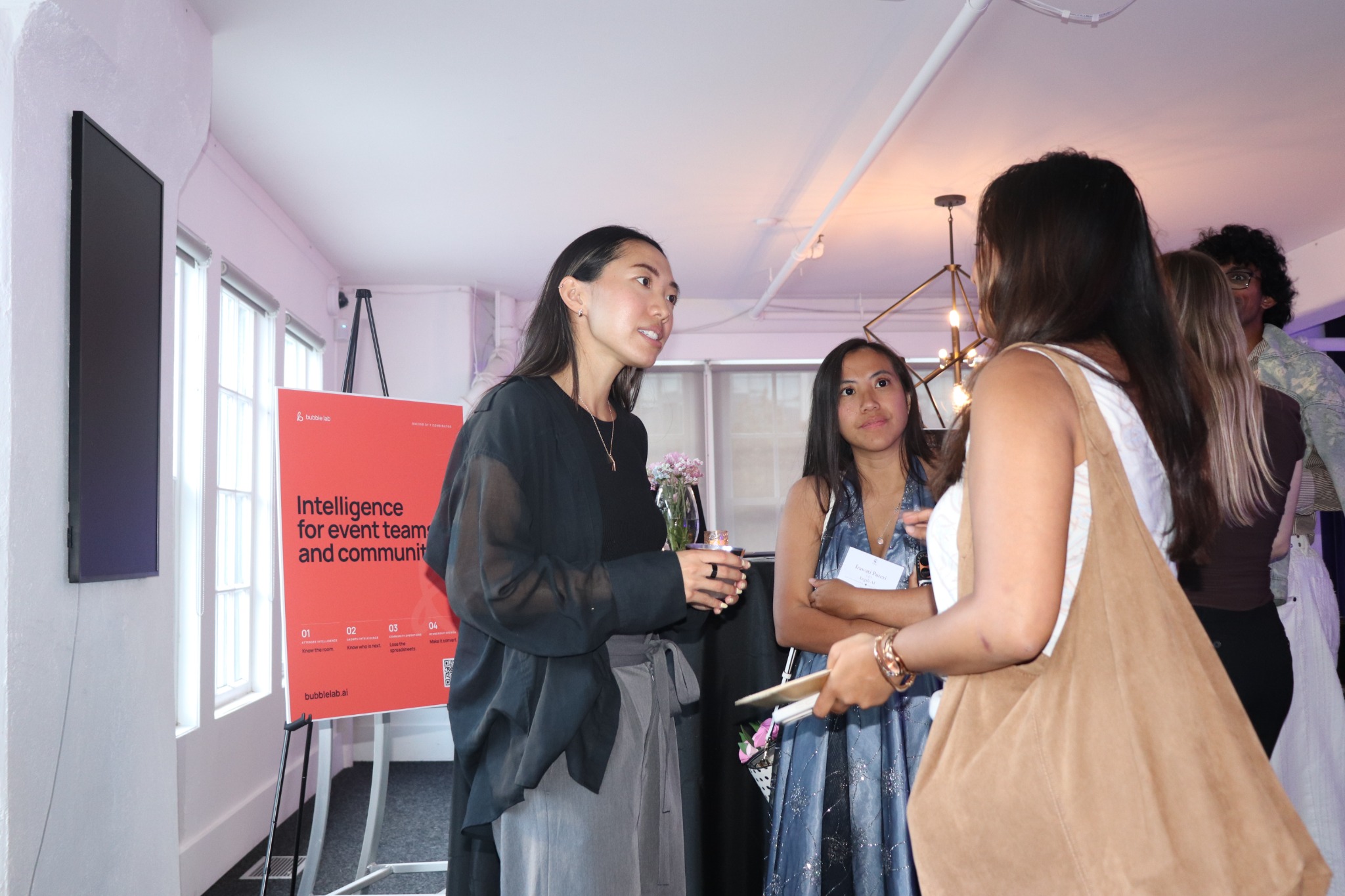 Guests in conversation at a technology event