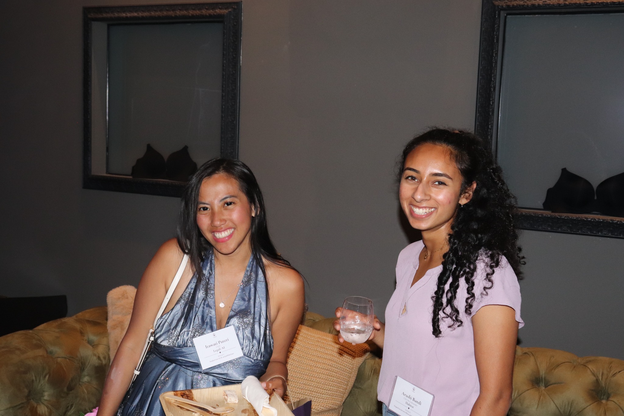 Two guests sharing a candid moment